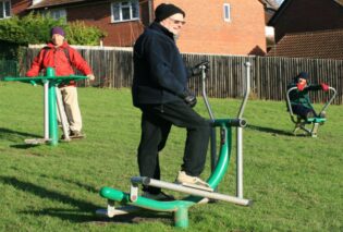 Photo of adults using the adult gym equipment Hempstead Lane Uckfield