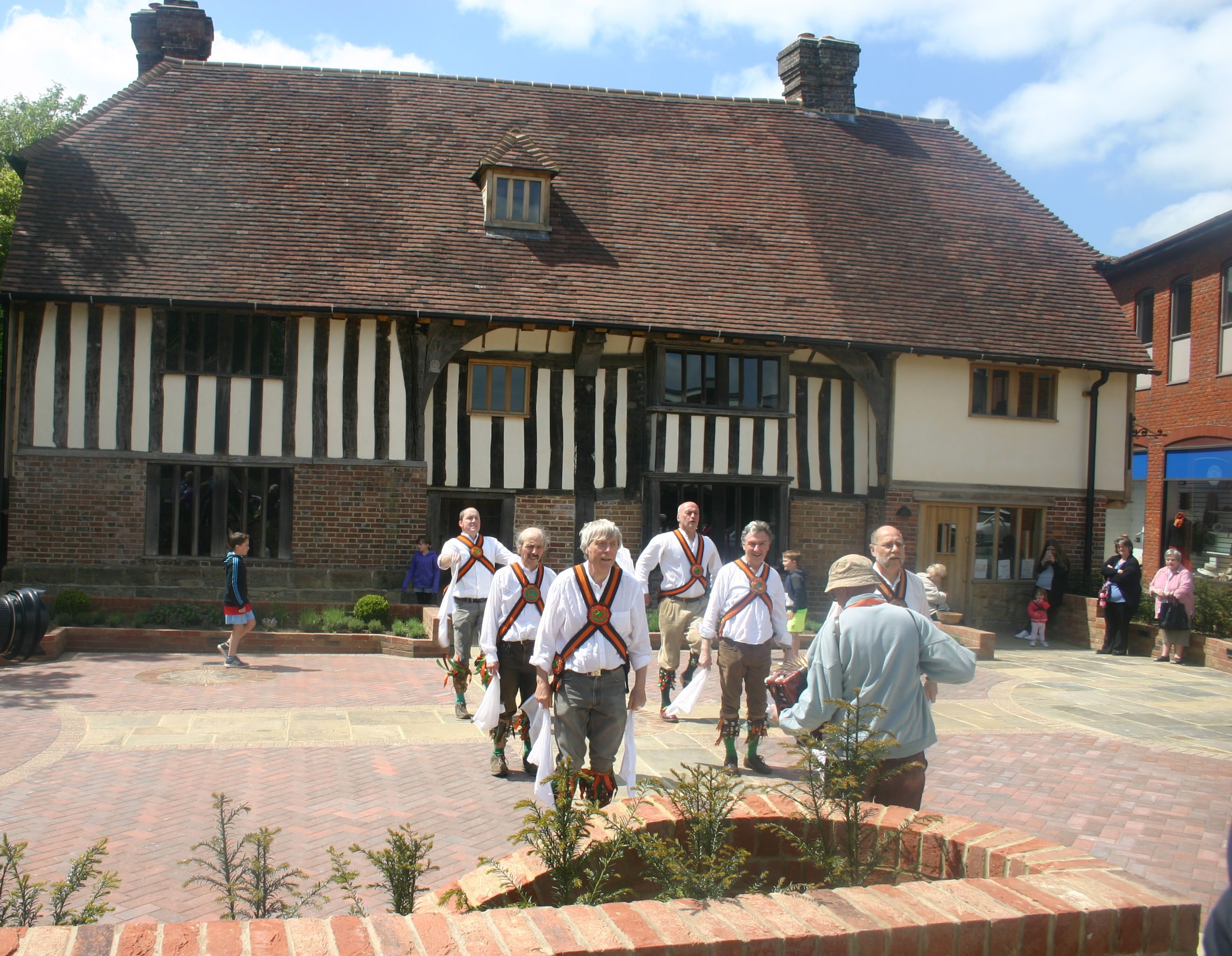 Morris men dancing outside Bridge Cottage