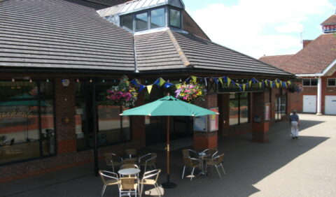 External view of Civic Centre with outside tables and chairs